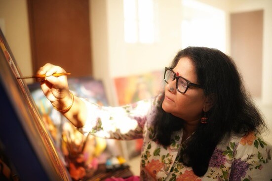Beena S Unnikrishnan closeup painting